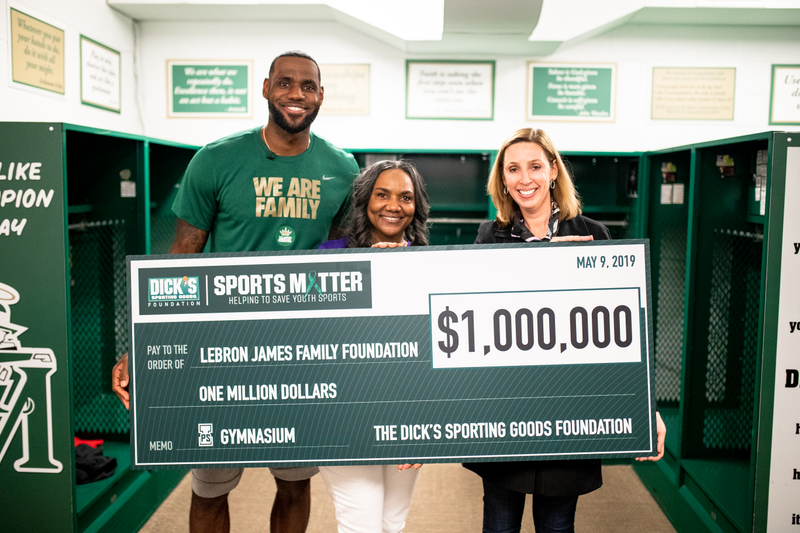 (l-r) LeBron James, his mother, Gloria James and Lauren Hobart of the DICK’S Sporting Goods Foundation